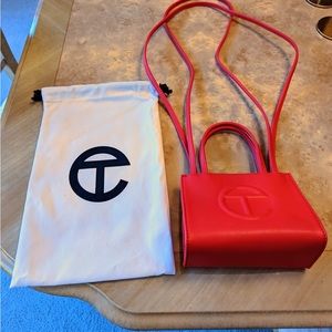 Well sought after red Telfar small bag available just in time for the holidays.